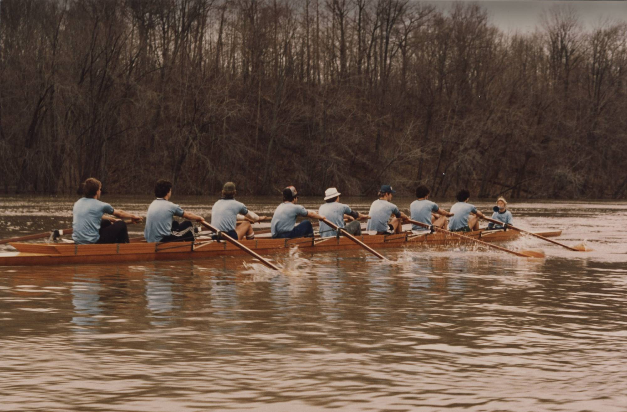 The GVSU rowing team trains on the Grand River in the late 1960s or early 1970s